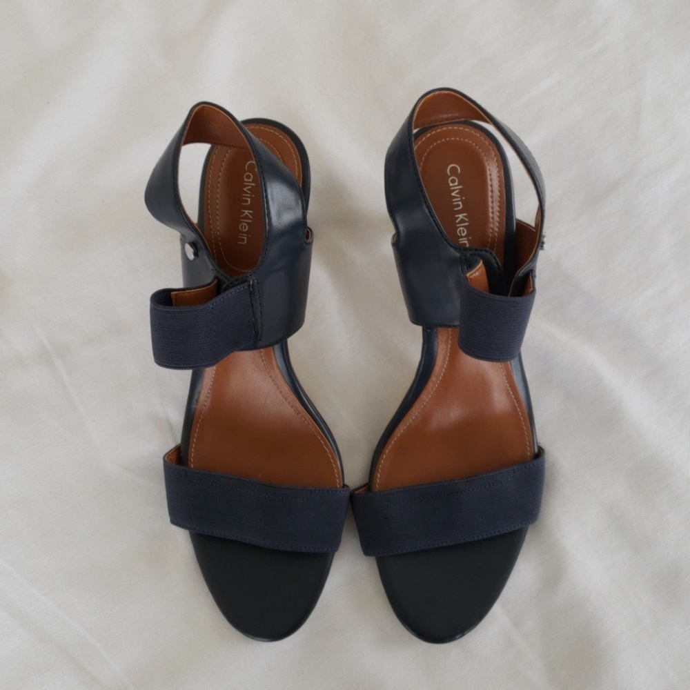 NWOT Calvin Klein navy leather and elastic heels